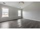 Spacious bedroom with vaulted ceiling, hardwood floors and two windows at 19420 Golden Meadow Way, Noblesville, IN 46060