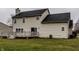 Two-story house with beige siding and a deck at 19420 Golden Meadow Way, Noblesville, IN 46060
