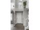 Bright entryway with high ceilings and grey flooring at 19420 Golden Meadow Way, Noblesville, IN 46060
