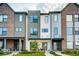 Modern three-story townhouses with front porches at 1817 N New Jersey St, Indianapolis, IN 46202