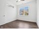 Bedroom with dark wood flooring and two windows at 1817 N New Jersey St, Indianapolis, IN 46202