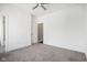 Bright bedroom with ceiling fan and access to bathroom at 1817 N New Jersey St, Indianapolis, IN 46202
