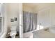 Clean bathroom with bathtub, shower, and window at 1817 N New Jersey St, Indianapolis, IN 46202