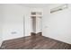 Bedroom with dark wood floors and access to hallway at 1817 N New Jersey St, Indianapolis, IN 46202