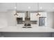 Modern kitchen boasting stainless steel appliances and a large island at 1817 N New Jersey St, Indianapolis, IN 46202