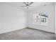 Well-lit bedroom with large window and grey carpeting at 1817 N New Jersey St, Indianapolis, IN 46202