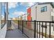 Private balcony overlooking townhomes and street at 1817 N New Jersey St, Indianapolis, IN 46202