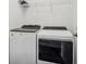Bright laundry room, featuring Whirlpool washer and dryer at 1817 N New Jersey St, Indianapolis, IN 46202