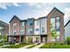 Modern three-story townhouses with front porches at 1817 N New Jersey St, Indianapolis, IN 46202