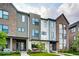 Modern three-story townhouses with front porches at 1817 N New Jersey St, Indianapolis, IN 46202
