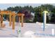 Community spray park with pergola and lounge chairs at 236 Sam Himsel Way, Danville, IN 46122