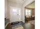 Bright entryway with hardwood floors and seating area at 236 Sam Himsel Way, Danville, IN 46122