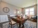 Home office features a large wooden desk, comfortable chair, and stylish decor at 236 Sam Himsel Way, Danville, IN 46122