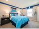 Bright bedroom with a blue themed bedding and swim decor at 236 Sam Himsel Way, Danville, IN 46122