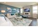 Relaxing living room with comfortable seating, large TV, and stylish decor at 236 Sam Himsel Way, Danville, IN 46122