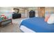 Main bedroom with a dresser, sitting area, and blue bedding at 236 Sam Himsel Way, Danville, IN 46122