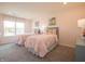 Lovely bedroom with two twin-size beds and window seat at 236 Sam Himsel Way, Danville, IN 46122