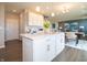 Kitchen island and open floor plan to dining area at 236 Sam Himsel Way, Danville, IN 46122