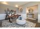 Spacious home office with a desk, seating area, and view into entryway at 236 Sam Himsel Way, Danville, IN 46122