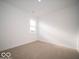 Bright bedroom with neutral carpeting and large window at 2298 Pine Valley Dr, Plainfield, IN 46168