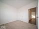 Simple bedroom with neutral walls and carpeting at 2298 Pine Valley Dr, Plainfield, IN 46168