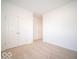 Spacious bedroom featuring double doors and carpet at 2298 Pine Valley Dr, Plainfield, IN 46168