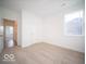 Simple bedroom with neutral walls and carpeting at 2298 Pine Valley Dr, Plainfield, IN 46168