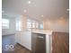 Kitchen island with white cabinets and quartz countertop at 2298 Pine Valley Dr, Plainfield, IN 46168