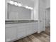 Double vanity bathroom with walk-in shower at 10549 Maidenhair Dr, Indianapolis, IN 46239