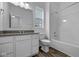 Clean bathroom with a tub, toilet and vanity at 10549 Maidenhair Dr, Indianapolis, IN 46239