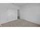 Bright bedroom with double door closet and neutral carpeting at 10549 Maidenhair Dr, Indianapolis, IN 46239