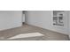 Bright bedroom with large window and carpet at 10549 Maidenhair Dr, Indianapolis, IN 46239