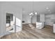 Bright dining area with hardwood floors and access to a patio at 10549 Maidenhair Dr, Indianapolis, IN 46239