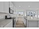 Modern kitchen features stainless steel appliances and an island at 10549 Maidenhair Dr, Indianapolis, IN 46239