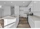Open concept kitchen with island and stainless steel appliances at 10549 Maidenhair Dr, Indianapolis, IN 46239
