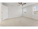 Spacious bedroom with neutral carpeting and ceiling fan at 18032 Ranger Way, Westfield, IN 46074