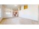 Open living room with vaulted ceilings and kitchen view at 1202 Creek Bend Dr, Greenwood, IN 46143