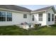 Small wooden deck outside back door with potted plants at 1202 Creek Bend Dr, Greenwood, IN 46143