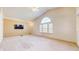 Spacious living room with vaulted ceilings and neutral decor at 1202 Creek Bend Dr, Greenwood, IN 46143