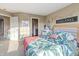 Bedroom with tropical decor and ensuite bathroom access at 236 N Liberty Blvd, Mooresville, IN 46158