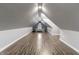 Large bonus room with hardwood floors and window at 236 N Liberty Blvd, Mooresville, IN 46158
