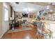 Spacious living room with hardwood floors, fireplace, and open kitchen view at 236 N Liberty Blvd, Mooresville, IN 46158