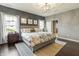 Spacious main bedroom with hardwood floors and en-suite bathroom at 236 N Liberty Blvd, Mooresville, IN 46158