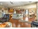 Open concept kitchen with island, stainless steel appliances, and hardwood floors at 236 N Liberty Blvd, Mooresville, IN 46158