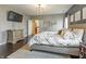 Bright bedroom with hardwood floors and en-suite bathroom access at 236 N Liberty Blvd, Mooresville, IN 46158