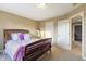 Charming bedroom with a double bed and access to another room at 236 N Liberty Blvd, Mooresville, IN 46158
