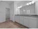 Bathroom with double vanity and walk-in shower at 10612 Maidenhair Dr, Indianapolis, IN 46239