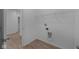 Laundry room with shelving and space for washer/dryer at 10612 Maidenhair Dr, Indianapolis, IN 46239