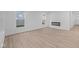 Bright living room with hardwood floors and fireplace at 10612 Maidenhair Dr, Indianapolis, IN 46239