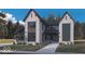 Modern farmhouse style home with a mix of gray and white exterior at 11135 Hamilton Run (Proposed Construction), Zionsville, IN 46077